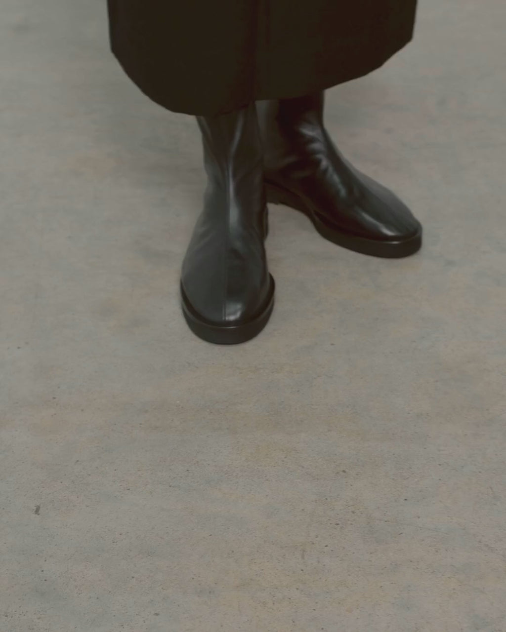 Joss Bootie in black Italian nappa leather, worn on-model and shown in movement